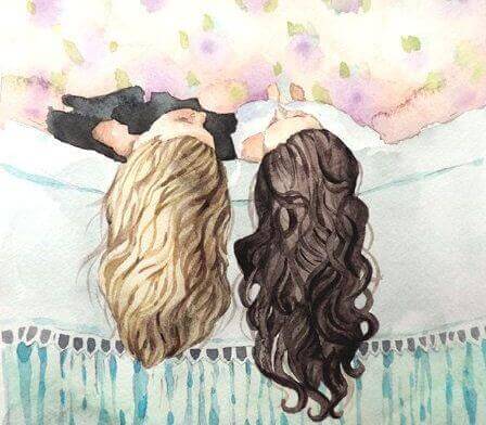 disegno due ragazze sdraiate sul letto