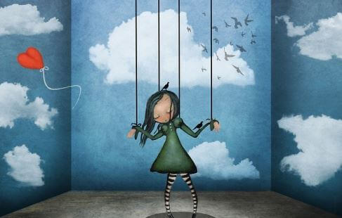 persona marionetta e palloncino a forma di cuore che vola via