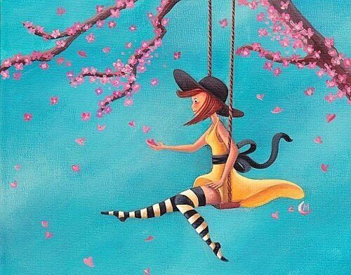 ragazza su altalena tra fiori di ciliegi