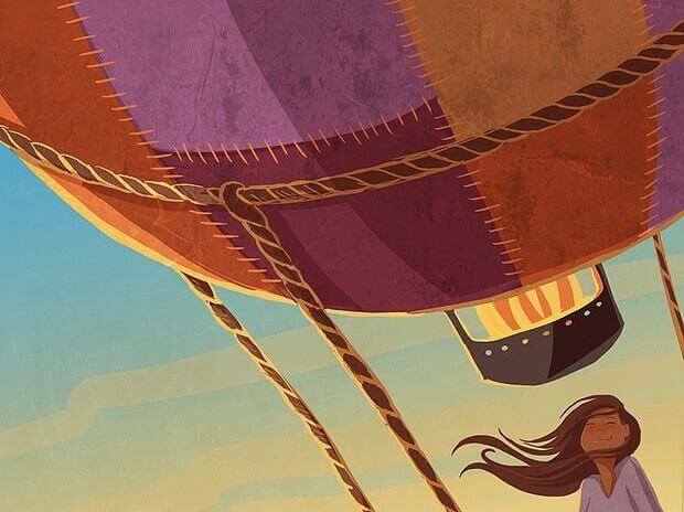 ragazza che viaggia in mongolfiera