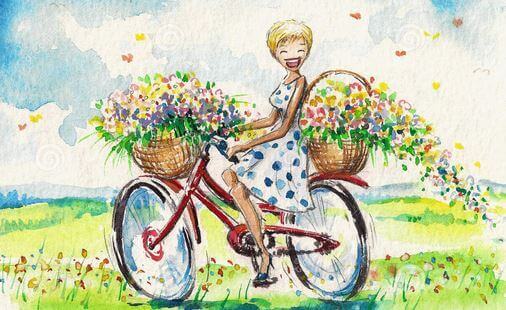ragazza in bici con i fiori