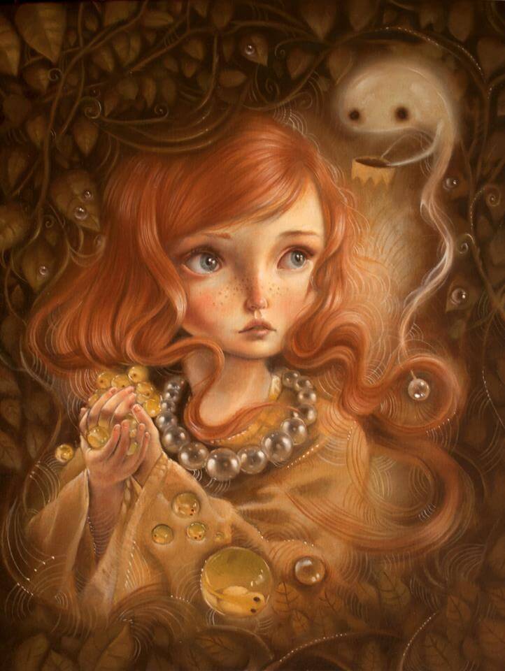 bambina triste con biglie in mano