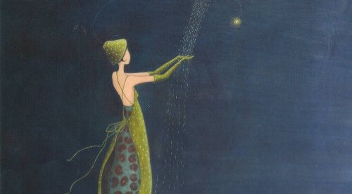 ragazza vestita di verde tocca pioggia di stelle