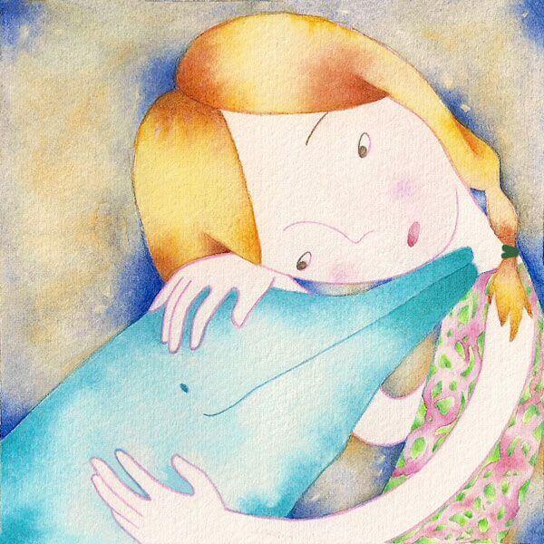 bambina che abbraccia un delfino