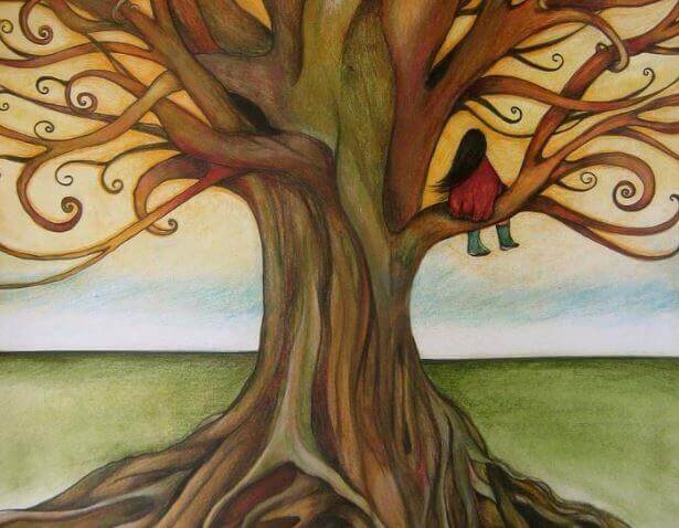 ragazza seduta su un albero