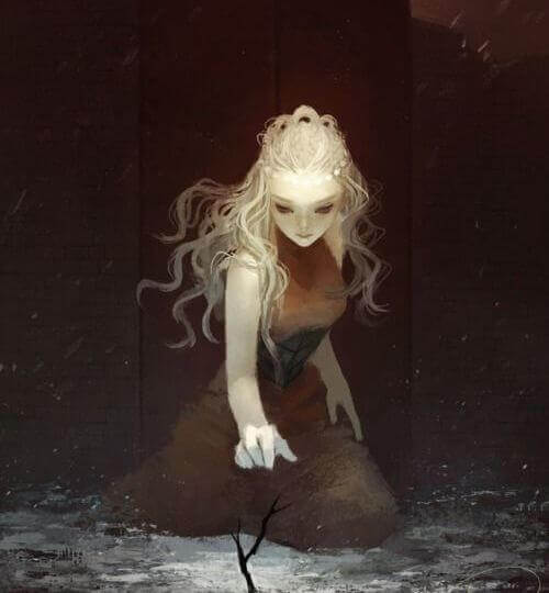 donna che estrae un ramo da un lago