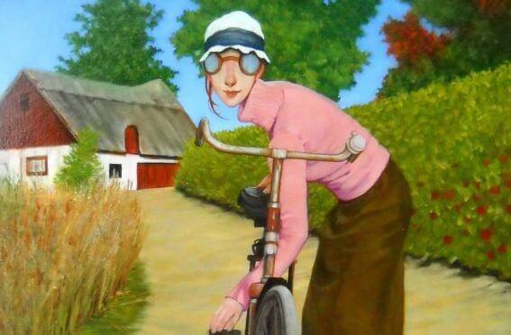 donna ciclista in campagna