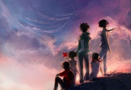 famiglia guarda l'alba