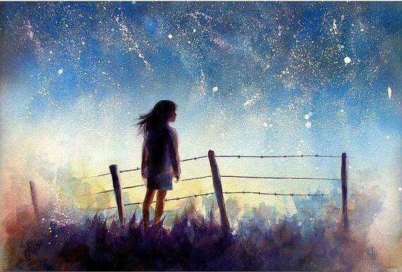 bambina dietro filo spinato