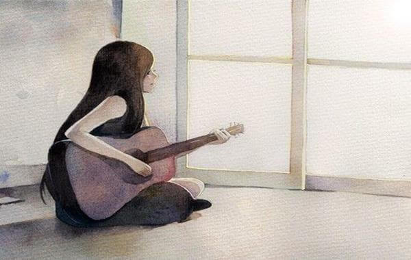 donna-suonando-chitarra
