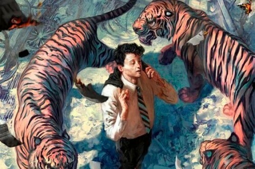 Uomo con tigri.