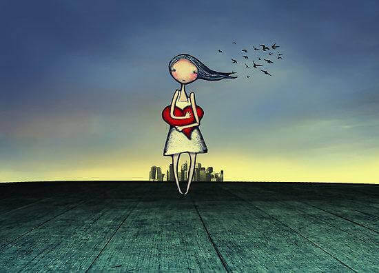 bambina con cuore in mano