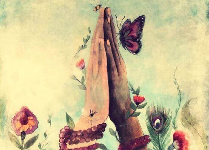 mani unite con farfalla
