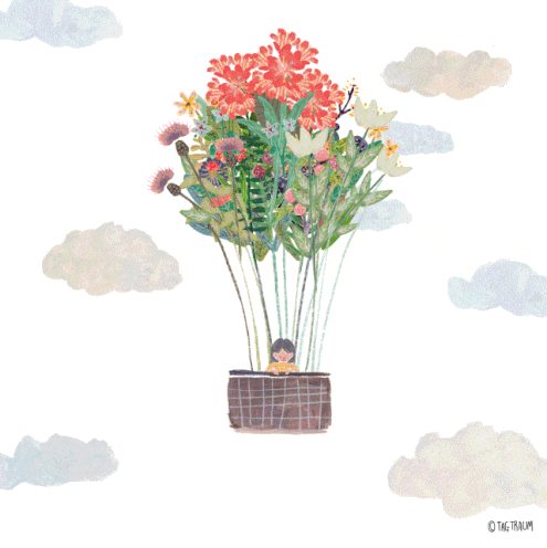 bambina in mongolfiera con fiori