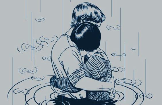 coppia-che-si-abbraccia-sotto-la-pioggia