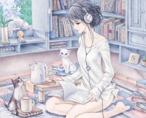 ragazza-che-studia-circondata-da-gatti