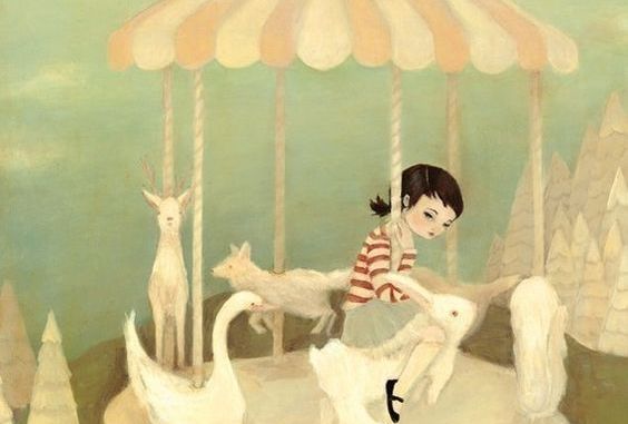 bambina-sulla-giostra