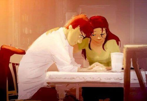 coppia-seduta-a-un-tavolo