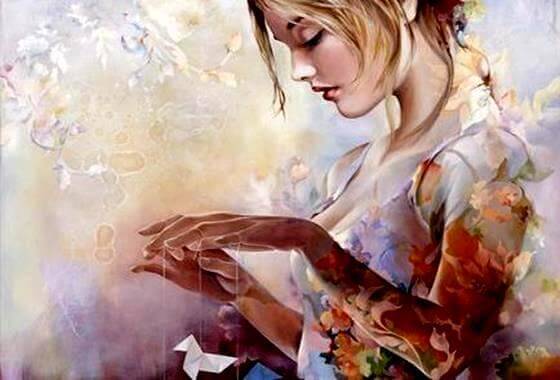 donna-con-uccellino-di-carta