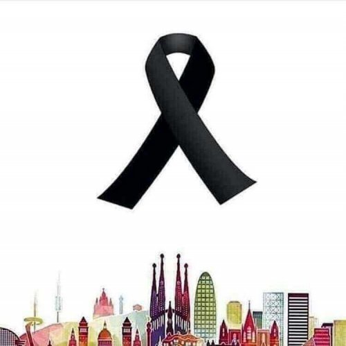 Simbolo di lutto sopra alla skyline di Barcellona