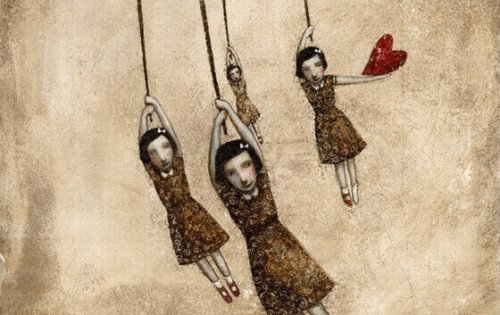 Quattro bambine, di cui una tiene in mano un cuore