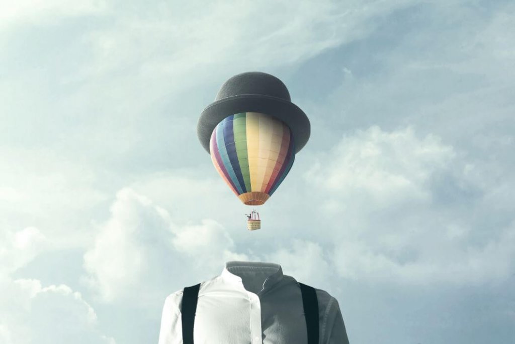 Uomo con testa di mongolfiera
