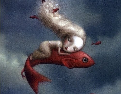 Bambina dorme su un pesce