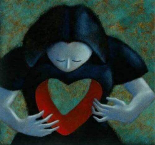 Donna con un buco a forma di cuore, in rappresentazione dei nostri vuoti