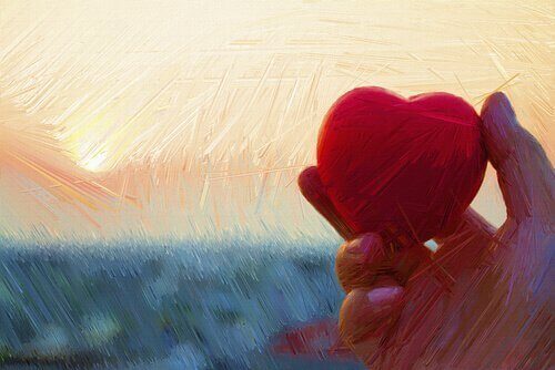 Mano con cuore, simbolo di intuizione