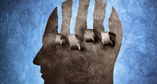 Profilo di una testa fatto di carta e con degli strappi, simbolo del disturbo da escoriazione