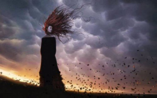 Donna triste in un campo