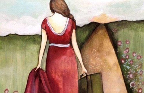 Donna di spalle con valigia