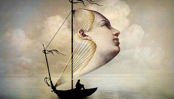 Barca con vela a forma di viso
