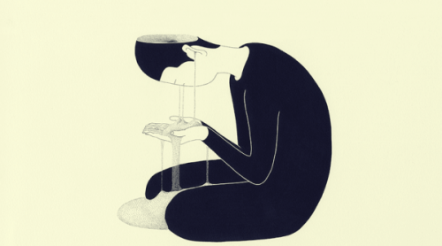 Persona con volto che si scioglie in granelli di sabbia