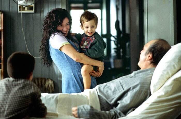 Ramón con una donna e un bambino