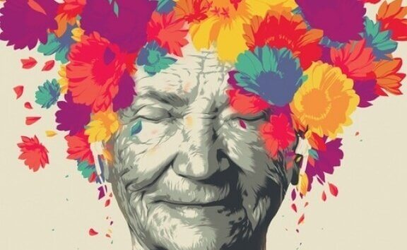 Primo piano di signora anziana con fiori in testa