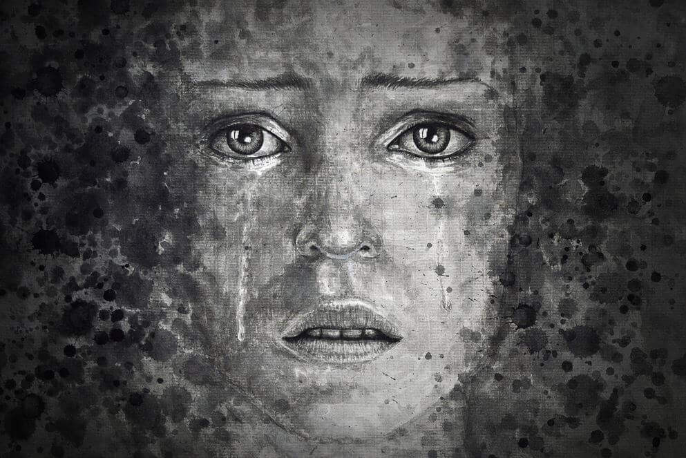 Volto con lacrime in bianco e nero
