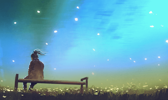 Bambina su una panchina di notte