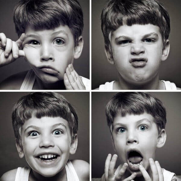 Bambino con diverse espressioni facciali