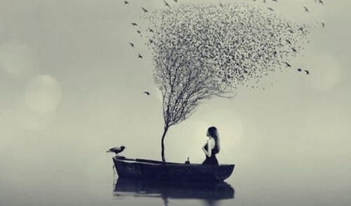 Donna in barca e albero spoglio in mezzo al mare 