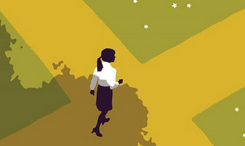 Donna davanti a un incrocio.