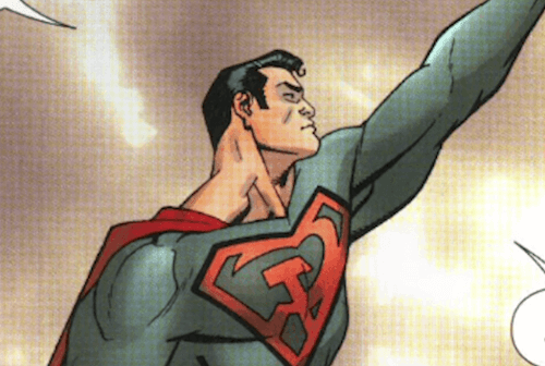 Superman col braccio sinistro alzato.