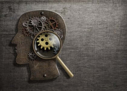 Testa con ingranaggi per rappresentare il modello dinamico della psicoanalisi.